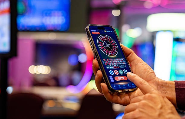 Boom City slot game interface showing urban-themed symbols and reel layout
